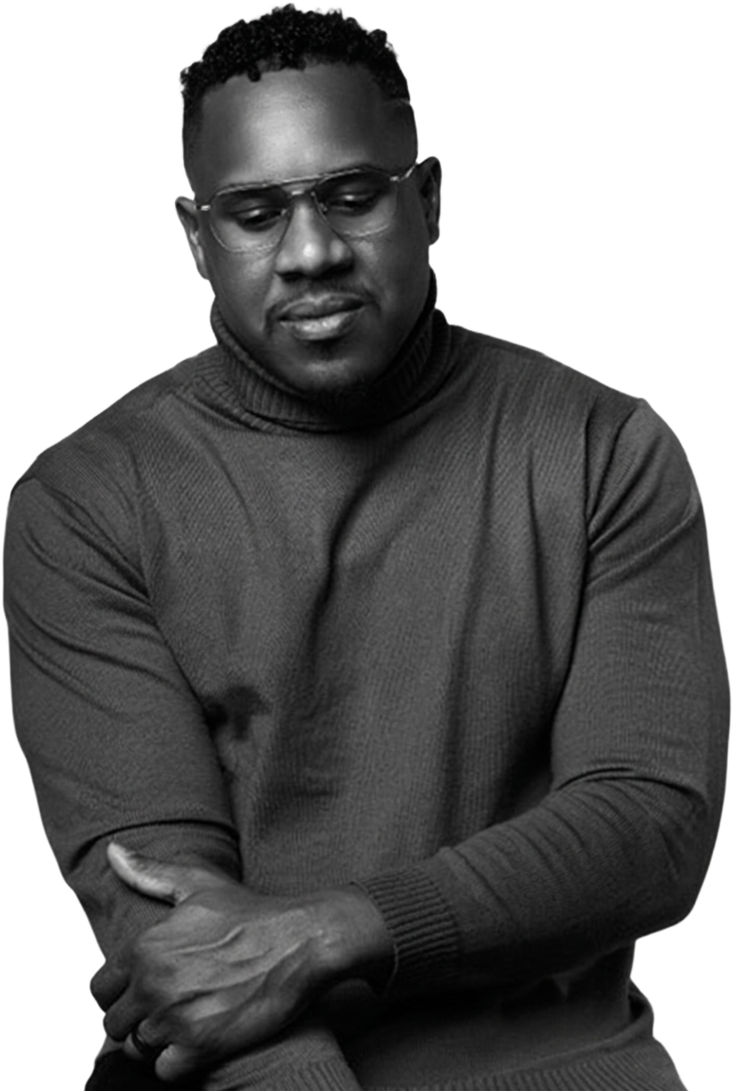 Chandler S. Bailey in a turtleneck and glasses