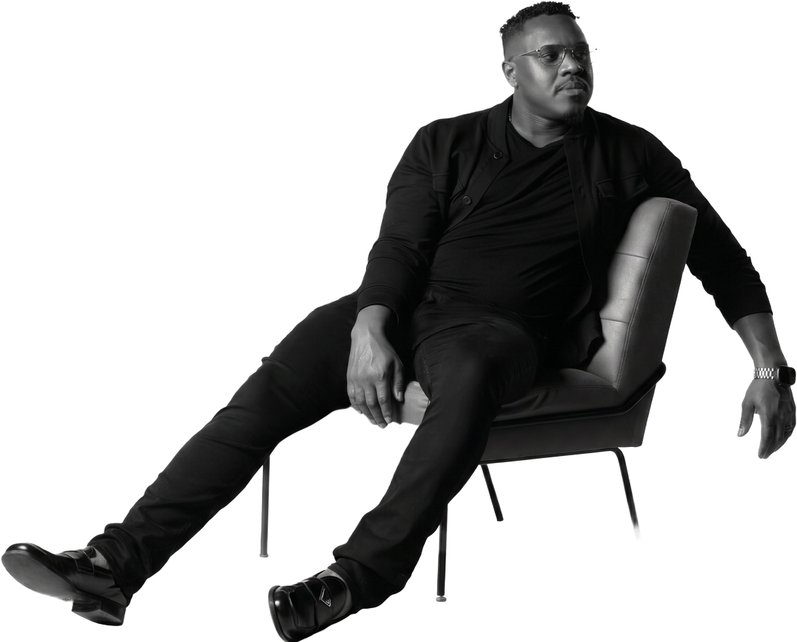 Chandler S. Bailey seated, looking toward the light